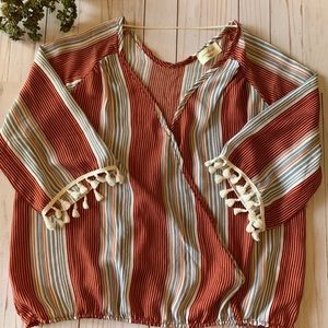 Striped blouse with Pom details